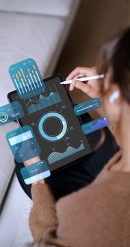 Tablet com dados e gráficos